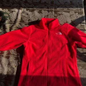neon orange north face fleece